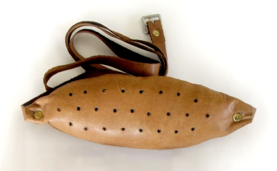 Stuffed leather pad on belt